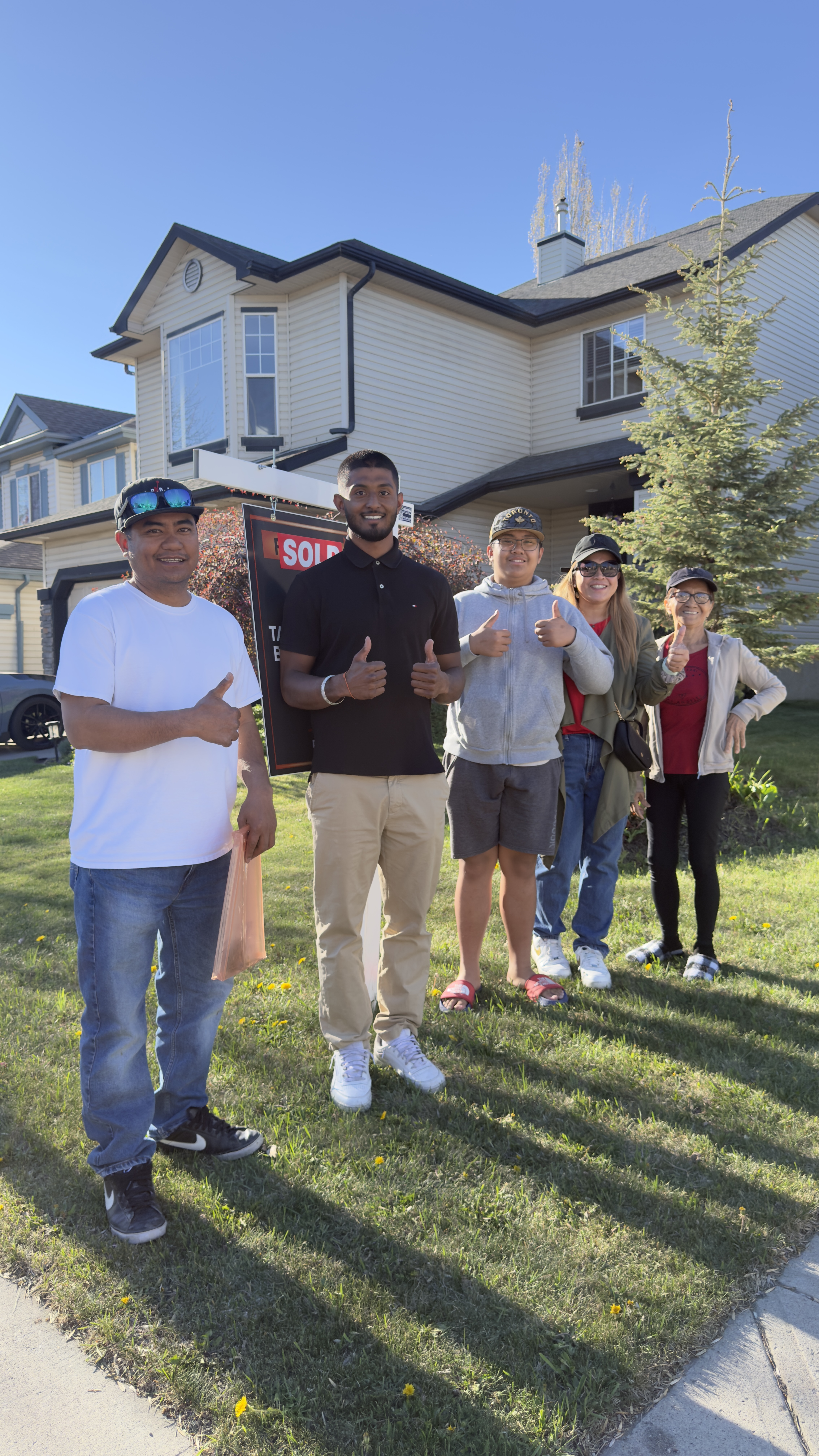 Harjas advising clients at a home showing